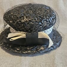 Cappello con tasca a fascia